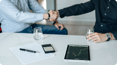 Business handshake meeting